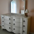 F28. Bassett Furniture double dresser with mirror. 37.5"h x 65"w x 21"d 